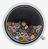 Maya's trinket box A metal and glass box with millefiori glasswork.
